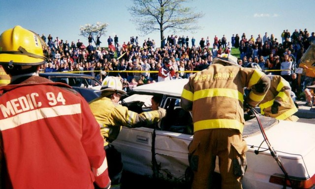 Rescue and ambulance personnel operate at the 1998 mock crash at AGHS